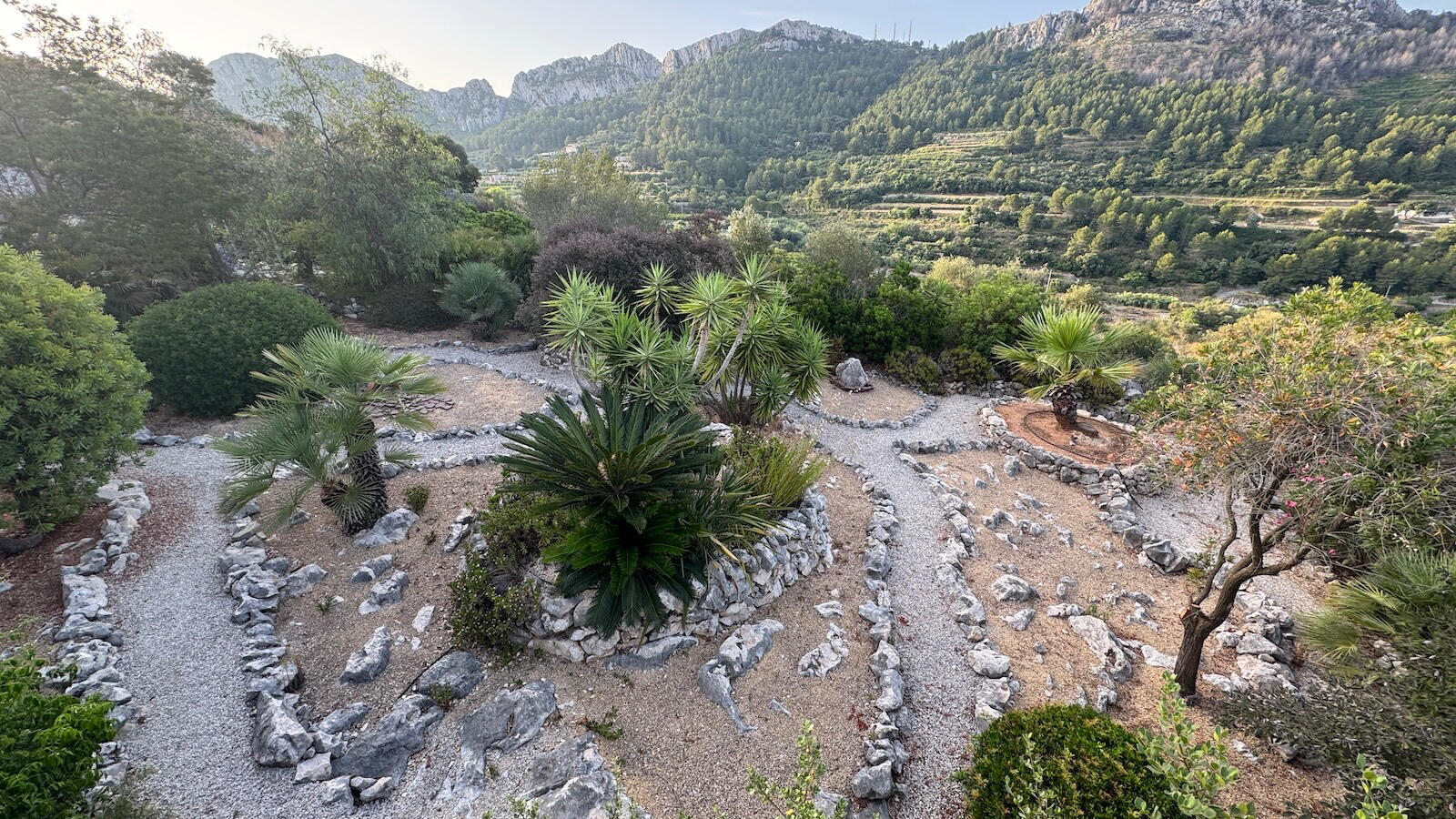 Back mediterranean garden bordering on the valley - you may see the occasional goat herd passing by