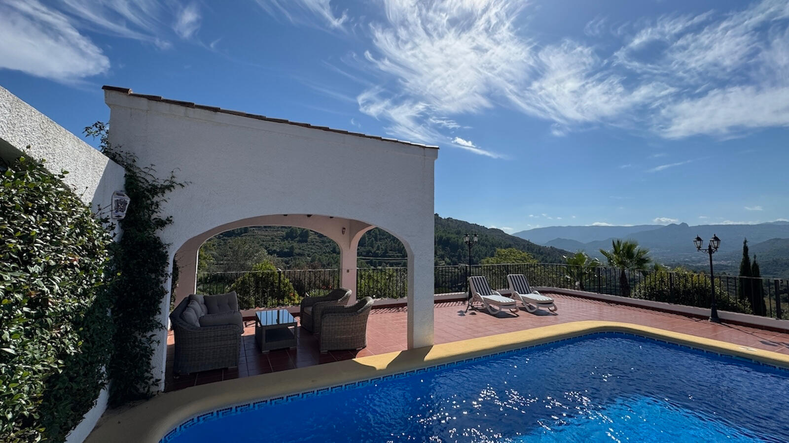 View of terrace, pool and valley. View of terrace, pool and valley.